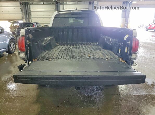 3TMDZ5BN4KM077208 2019 TOYOTA TACOMA White Вид ззаду