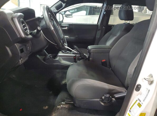 3TMDZ5BN4KM077208 2019 TOYOTA TACOMA White Вид салону спереду
