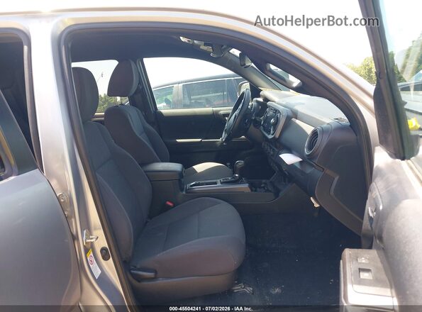 3TMDZ5BN5KM067853 2019 TOYOTA TACOMA Серебряный Вид салона спереди