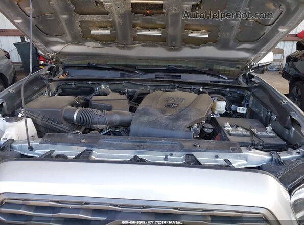 3TMDZ5BN6PM142003 2023 TOYOTA TACOMA Silver უკანა ხედი