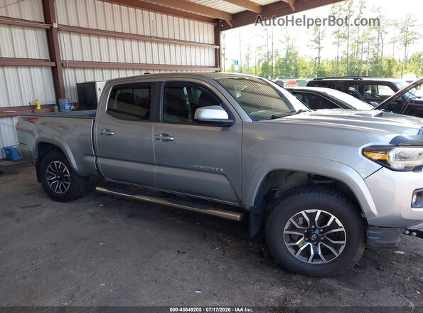 3TMDZ5BN6PM142003 2023 TOYOTA TACOMA Silver უკანა სალონის ხედი