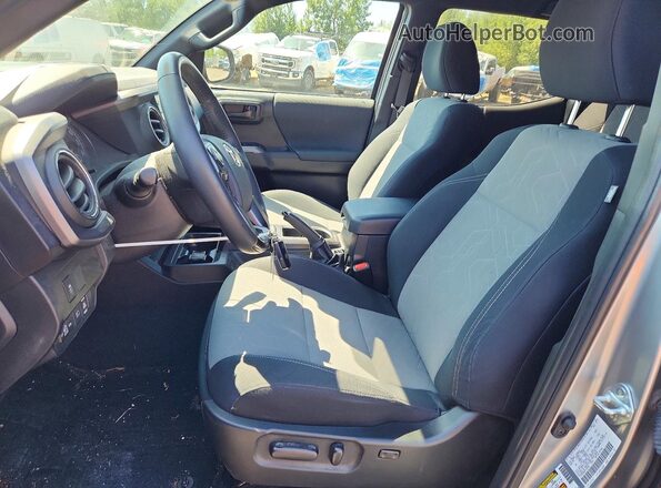 3TMDZ5BN6PM156340 2023 TOYOTA TACOMA Серебряный Вид салона спереди