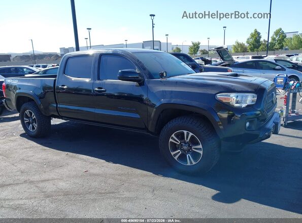 3TMDZ5BN9KM059612 2019 TOYOTA TACOMA Black Vista interior trasera