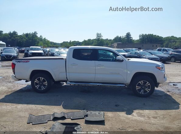 3TMDZ5BNXJM042459 2018 TOYOTA TACOMA White Rear interior view
