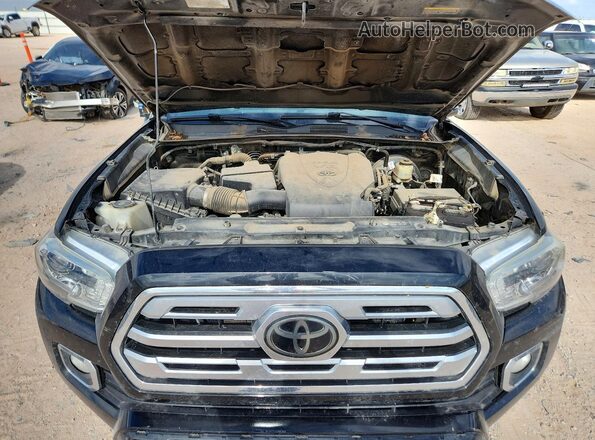 3TMEZ5CN2JM071442 2018 TOYOTA TACOMA Black Widok wnętrza z tyłu