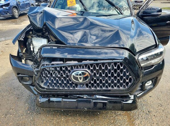 3TMGZ5AN3MM409995 2021 TOYOTA TACOMA Black უკანა სალონის ხედი
