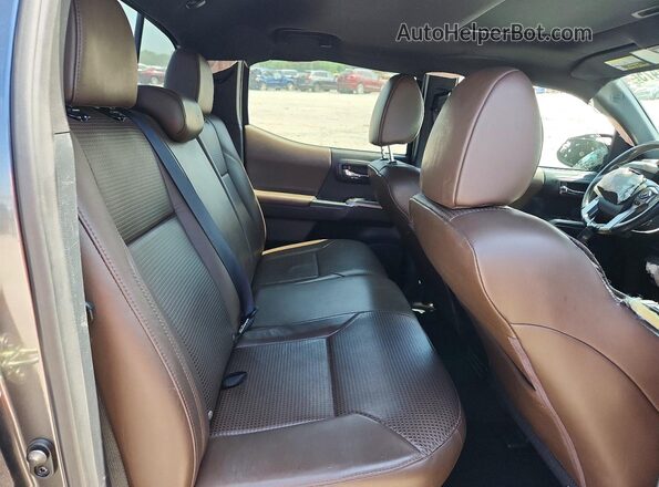 3TMGZ5AN4HM087745 2017 TOYOTA TACOMA Gray Rear seats view