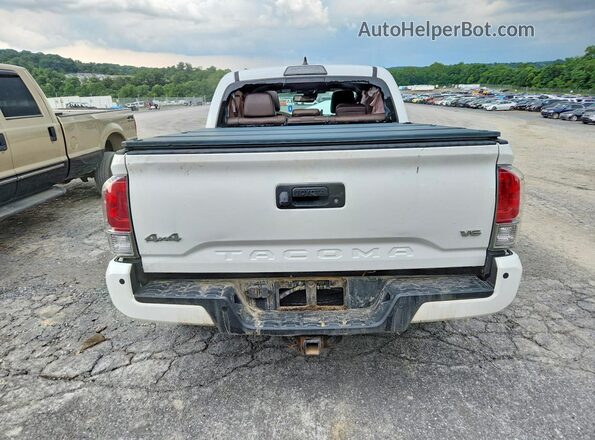 3TMGZ5AN7JM155087 2018 TOYOTA TACOMA White Rear view
