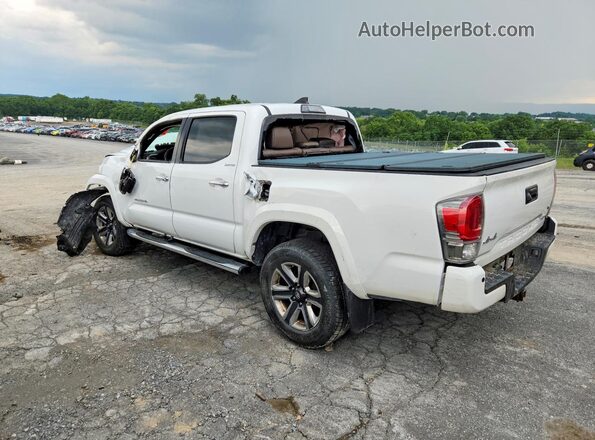 3TMGZ5AN7JM155087 2018 TOYOTA TACOMA White Rear left