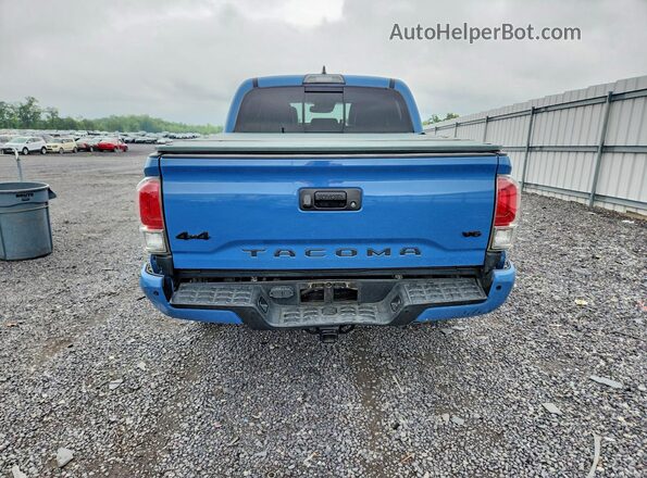 3TMGZ5AN7KM246426 2019 TOYOTA TACOMA Blue უკანა ხედი
