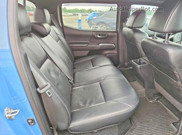 3TMGZ5AN7KM246426 2019 TOYOTA TACOMA Blue უკანა სავარძლების ხედი