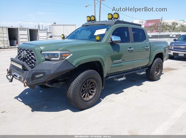 3TMGZ5AN9MM386304 2021 TOYOTA TACOMA Green Vista tres cuartos delantera izquierda