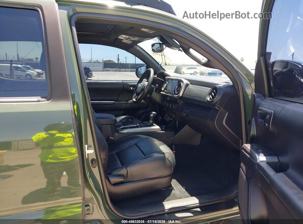 3TMGZ5AN9MM386304 2021 TOYOTA TACOMA Green Vista interior delantera