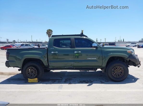 3TMGZ5AN9MM386304 2021 TOYOTA TACOMA Green Vista interior trasera