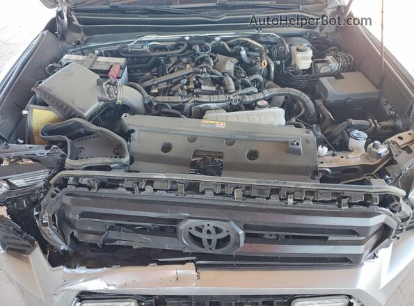 3TMKB5FN1SM043958 2025 TOYOTA TACOMA Silver Սալոնի հետևի տեսք