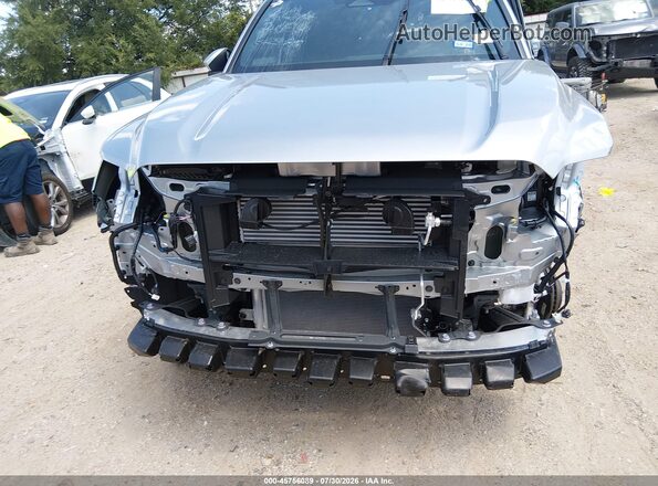 3TMKB5FN4TM065678 2026 TOYOTA TACOMA Silver Rear interior view