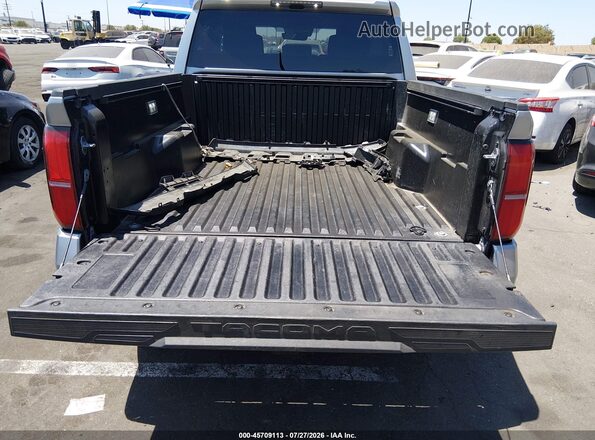 3TMKB5FN7RM021411 2024 TOYOTA TACOMA Silver ხელსაწყოთა პანელის ხედი