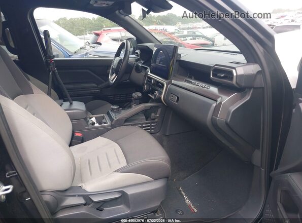 3TMLB5JN0SM096212 2025 TOYOTA TACOMA Black Front interior view