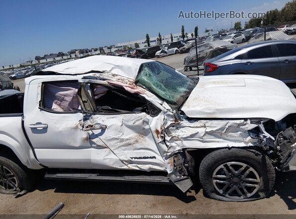 3TMLB5JN2RM006780 2024 TOYOTA TACOMA White Rear interior view