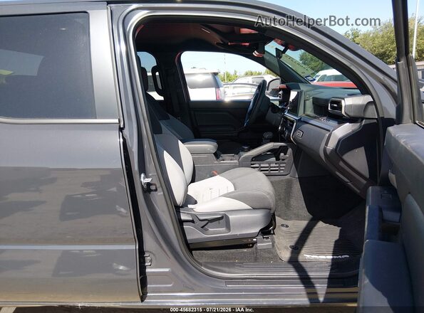 3TMLB5JN3TM230289 2026 TOYOTA TACOMA Black Front interior view