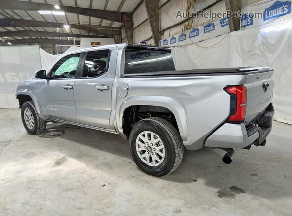 3TMLB5JN3TM277595 2026 TOYOTA TACOMA Silver Trasero izquierdo