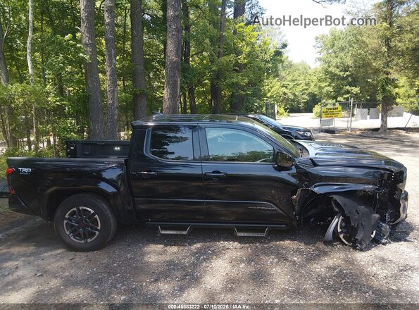 3TMLB5JN5TM245201 2026 TOYOTA TACOMA Black Rear interior view