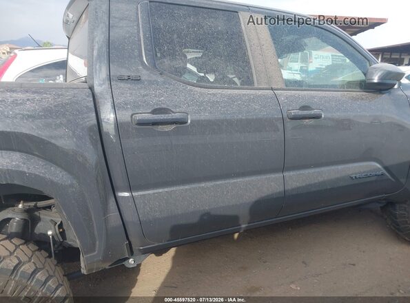3TMLB5JN8SM092795 2025 TOYOTA TACOMA Black Вид задньої частини салону