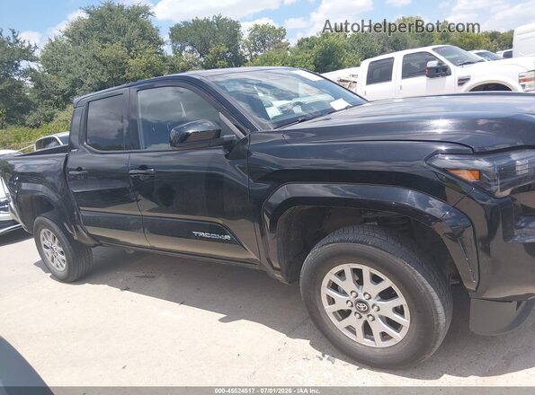 3TMLB5JN9SM088609 2025 TOYOTA TACOMA Black Widok wnętrza z tyłu