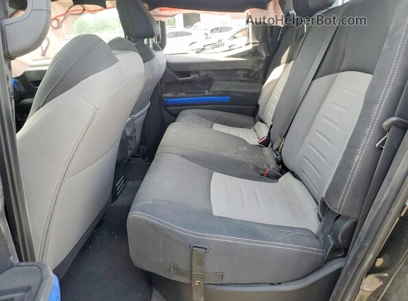 3TMLB5JN9SM133189 2025 TOYOTA TACOMA Black Սալոնի հետևի տեսք