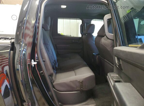 3TMLB5JN9SM150283 2025 TOYOTA TACOMA Black Հետևի նստատեղերի տեսք