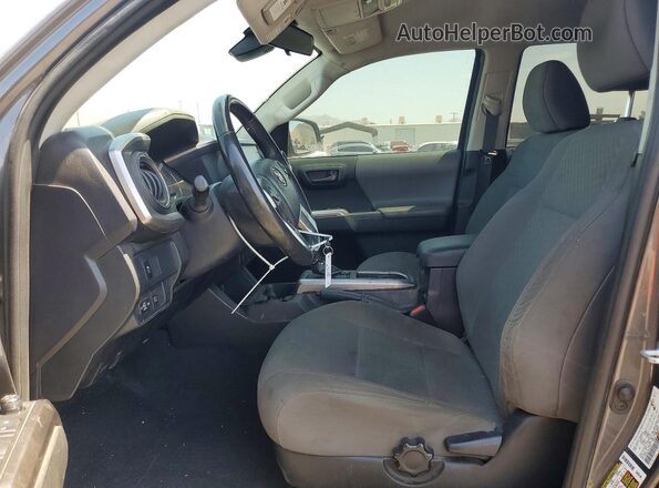 3TYAX5GN2MT014729 2021 TOYOTA TACOMA Gray Front interior view