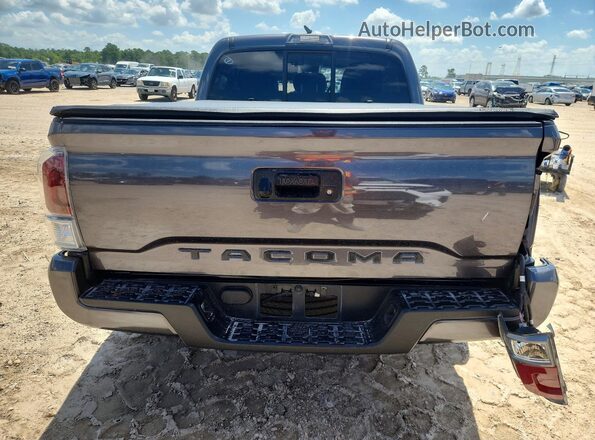 3TYAX5GN3PT072062 2023 TOYOTA TACOMA Gray Հետևի տեսք