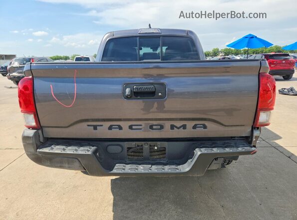 3TYAX5GN6MT020744 2021 TOYOTA TACOMA Gray Rear view