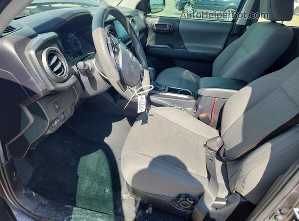 3TYAX5GN6MT020744 2021 TOYOTA TACOMA Gray Front interior view
