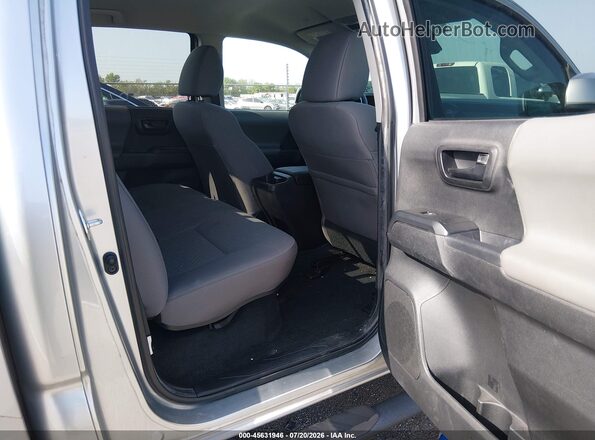 3TYAX5GN6NT043863 2022 TOYOTA TACOMA Silver VIN sticker view