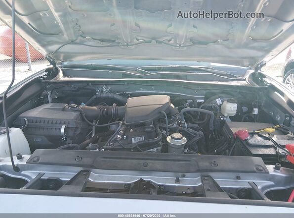 3TYAX5GN6NT043863 2022 TOYOTA TACOMA Silver Rear view