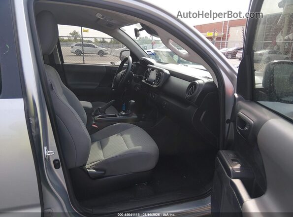 3TYAX5GN6PT073772 2023 TOYOTA TACOMA Silver Widok wnętrza z przodu