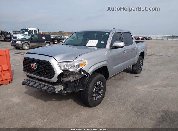 3TYAX5GN6PT073772 2023 TOYOTA TACOMA Silver Przód lewy