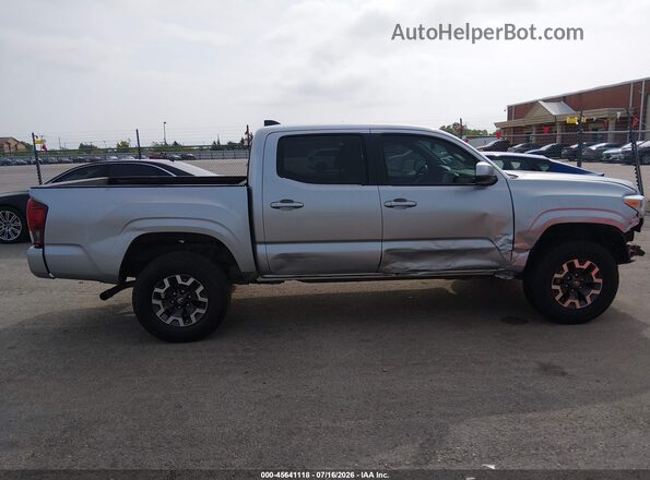 3TYAX5GN6PT073772 2023 TOYOTA TACOMA Silver Widok wnętrza z tyłu