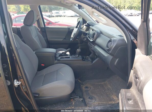 3TYAX5GN7PT080388 2023 TOYOTA TACOMA Black Widok wnętrza z przodu