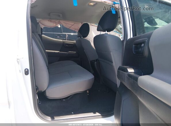 3TYAX5GN9NT057188 2022 TOYOTA TACOMA White Widok naklejki z numerem VIN