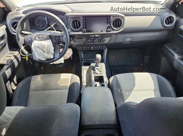 3TYAZ5CN6MT002759 2021 TOYOTA TACOMA White Dashboard view