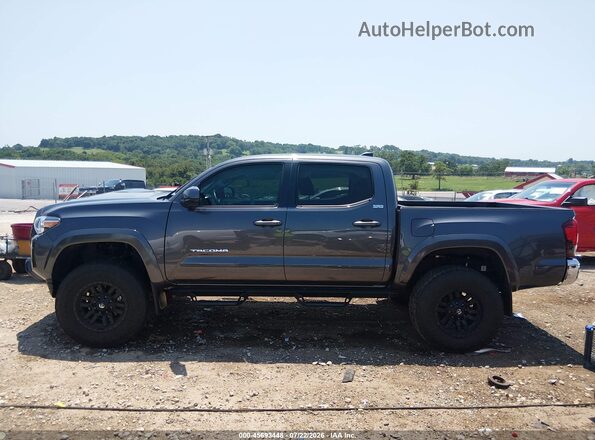 3TYAZ5CN6PT038696 2023 TOYOTA TACOMA Gray Вид задньої частини салону