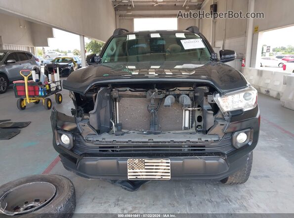 3TYAZ5CNXNT018352 2022 TOYOTA TACOMA Черный Вид задней части салона