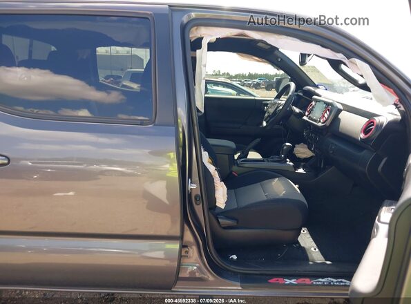 3TYCZ5AN0PT119382 2023 TOYOTA TACOMA Gray Vista interior delantera