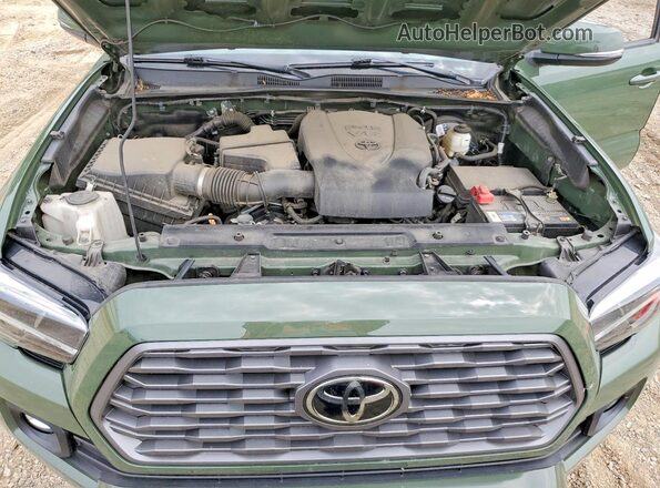 3TYCZ5AN2NT078461 2022 TOYOTA TACOMA Green Вид задньої частини салону