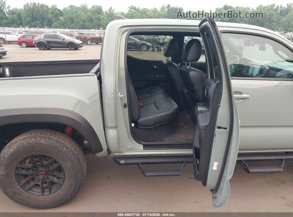 3TYCZ5AN3MT048495 2021 TOYOTA TACOMA Green VIN კოდის სტიკერის ხედი