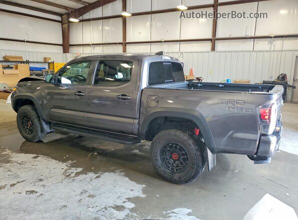 3TYCZ5AN4NT100850 2022 TOYOTA TACOMA Gray Trasero izquierdo