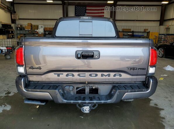 3TYCZ5AN4NT100850 2022 TOYOTA TACOMA Gray Vista trasera