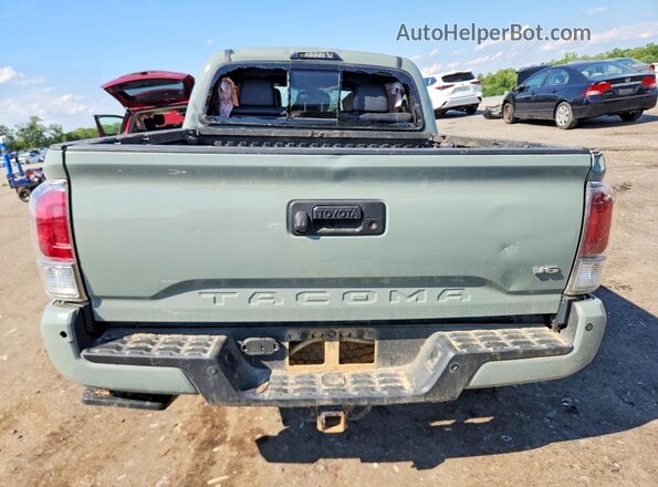 3TYCZ5AN4PT154765 2023 TOYOTA TACOMA Turquoise Вид ззаду